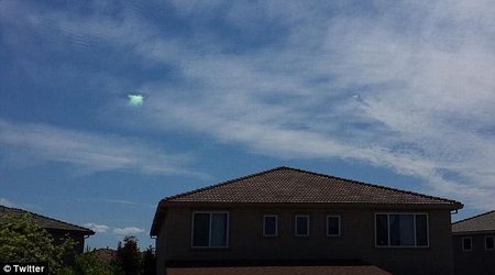 What caused a mystery hole in the clouds? - PHOTO
