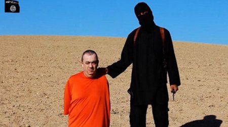 İŞİD daha bir başkəsmə anını yayımladı - Şok video