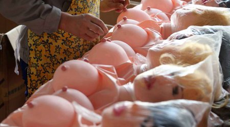 Doors (and legs) open to the sex doll factory where plastic women cost £30 - PHOTO