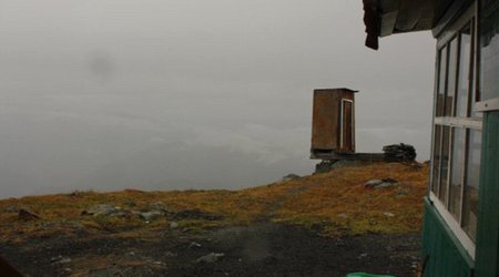 Precarious toilet is perched over 2,000ft Siberian cliff - PHOTO
