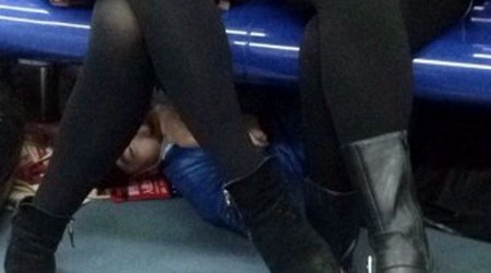 Pervert spotted hiding under seats on Beijing Metro trains - PHOTO+VIDEO