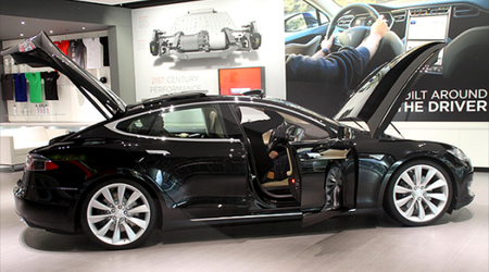 Tesla stock hits record high