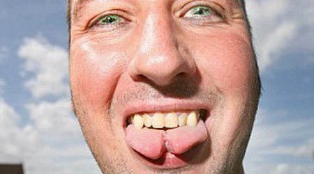 Horn implants, fanged teeth and a forked tongue - PHOTO+VIDEO