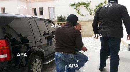 Azeri court rules to keep journalist in prison pending trial