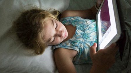 Bright light from Kindles and iPads keep us awake