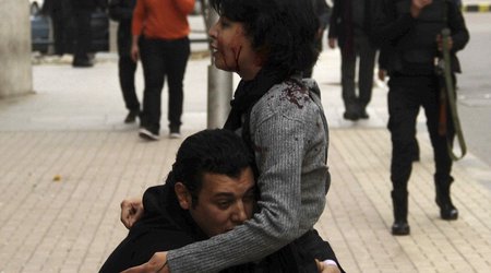 Mourners gather to bury mother, 32, gunned down by Cairo police