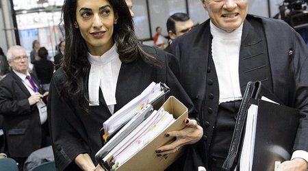 It's Amal versus the genocide-deniers