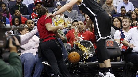 Brooklyn Nets center crashes into courtside waitress