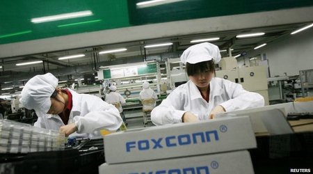 Apple bans 'bonded servitude' for factory workers