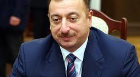 Azeri president calls manat's devaluation necessary measure
