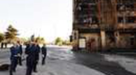 President Aliyev visits Baku building destroyed by fire