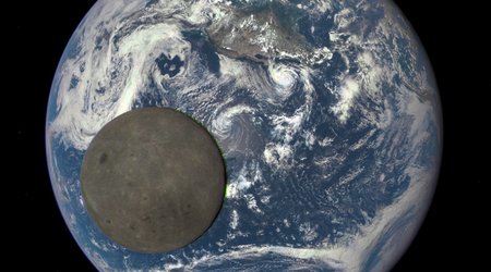 Space telescope catches the moon crossing the Earth from the 'dark side'
