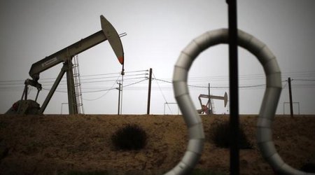 Oil turns higher as Wall Street rally offsets inventory rise