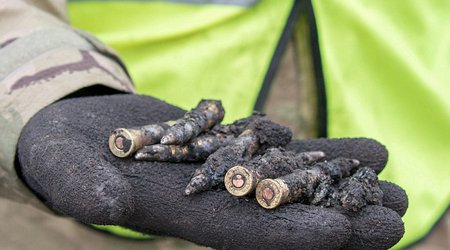 Archaeologists uncover precious items from plane that crashed during World War II