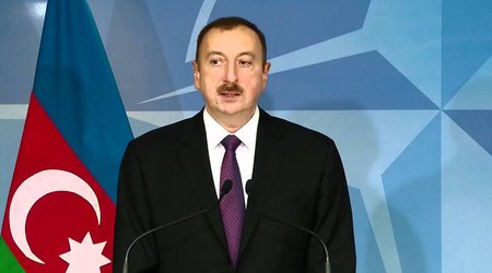Aliyev says manat’s devaluation caused by oil price slump