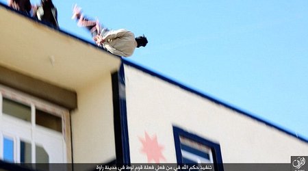 Bound man being hurled off the top of a building after he was accused of being gay
