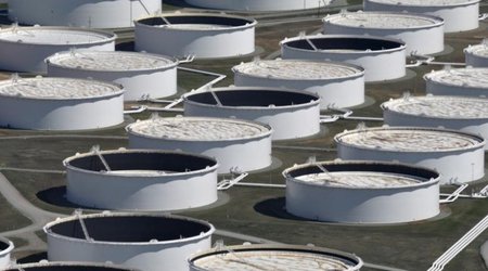 Oil prices fall on U.S. crude stocks build