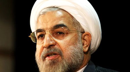 Iran's Rouhani says OPEC's cooperation to stabilise oil market 
