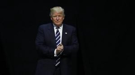 Trump issues statement defending travel bans