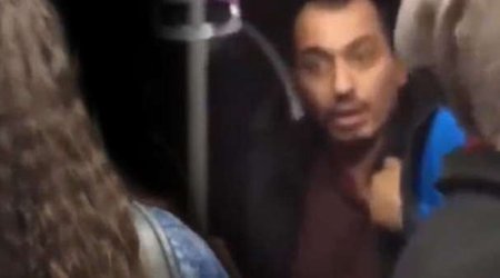 Metroda öpüşən sevgililərə sərt reaksiya - VİDEO  