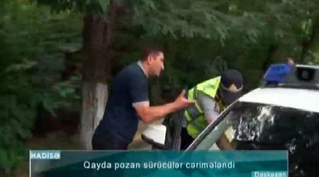 Sürücü polisə: “Yazma” dedim, yekə kişisən – Video