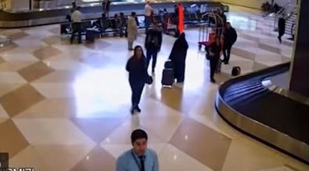 Dubaydan gələn ər-arvadın aereportda telefon "ssenari"si - VİDEO