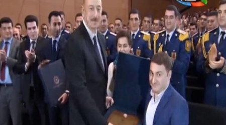 İlham Əliyevin əlil gəncə jesti bütün zalı ayağa qaldırdı - VİDEO