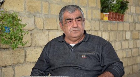 Ayaqları yoxdur, "Jiquli"ni əli ilə sürür... - VİDEO