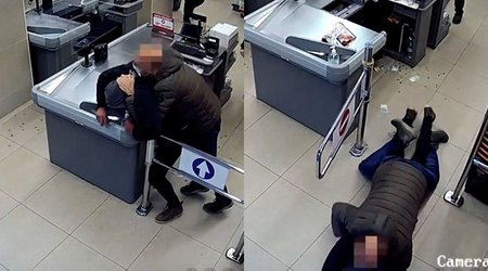 Polis əlində bıçaqla kassanı yarmaq istəyən şəxsi peşəkarlıqla zərərsizləşdirdi - VİDEO