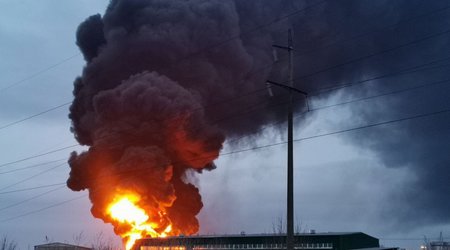 Ukrainian helicopters fire on oil depot in Russia