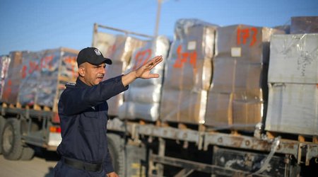 Israel opens Gaza border to let in humanitarian aid