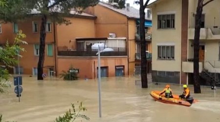 Italy flood deaths rise to 11 as thousands wait to come home