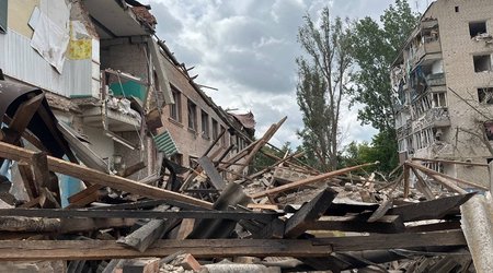 Russian shells residential area in Ukraine, killing 4, injuring 11