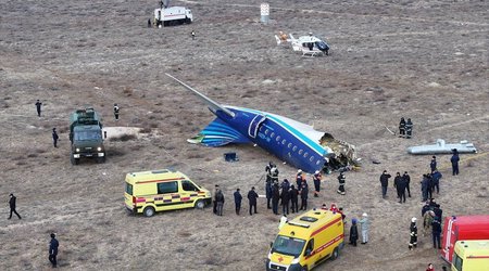 Plane crash survivor recounts stewardess's courage in the face of disaster