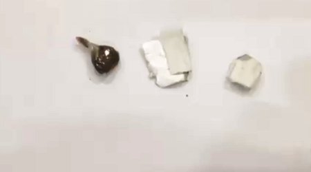Ana həbsdəki oğluna narkotik keçirmək istəyib