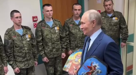 Putin visits military hospital with icons gifted by soldiers