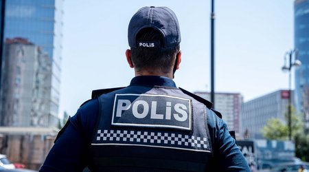 Traffic police warn drivers and pedestrians amid rainy weather