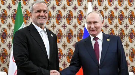Putin iranlı həmkarı ilə görüşüb