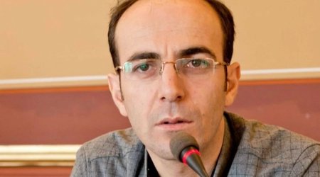 Detained journalist allowed to attend his mother’s funeral