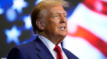 Trump says his visit to China can be delayed by about a month