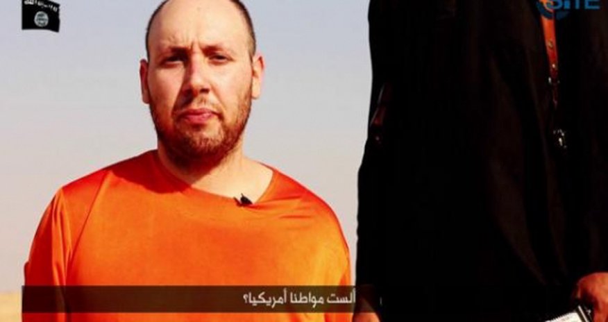 Islamic State issues video of beheading of U.S. hostage Islamic State issues video of beheading of U.S. hostage