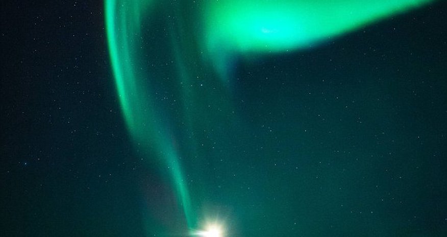 Magical moment a stargazer appears to grab an orb out of the sky - PHOTO Magical moment a stargazer appears to grab an orb out of the sky - PHOTO