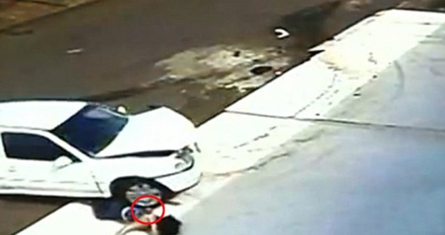 Incredible footage shows the moment car goes over a five-year-old's HEAD - PHOTO+VIDEO Incredible footage shows the moment car goes over a five-year-old's HEAD - PHOTO+VIDEO