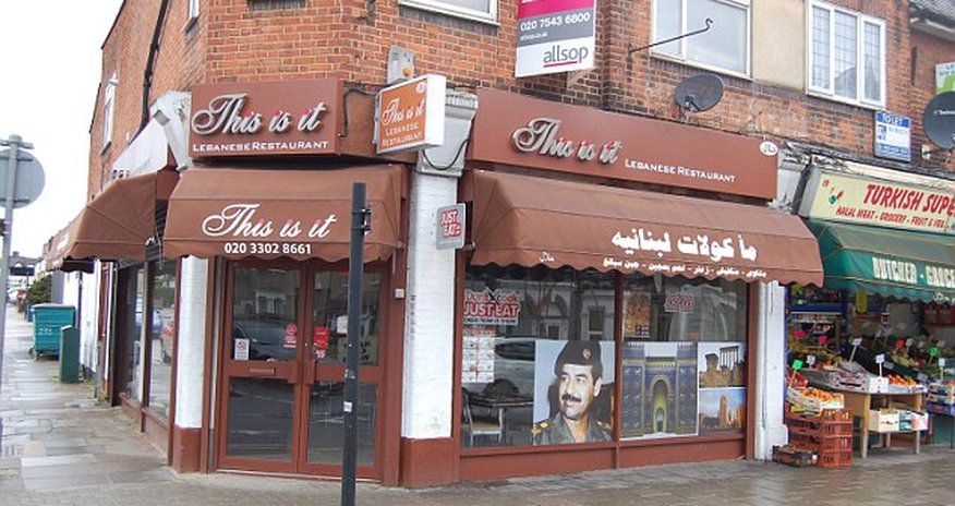Lebanese restaurant owner places giant poster of SADDAM HUSSEIN - PHOTO Lebanese restaurant owner places giant poster of SADDAM HUSSEIN - PHOTO