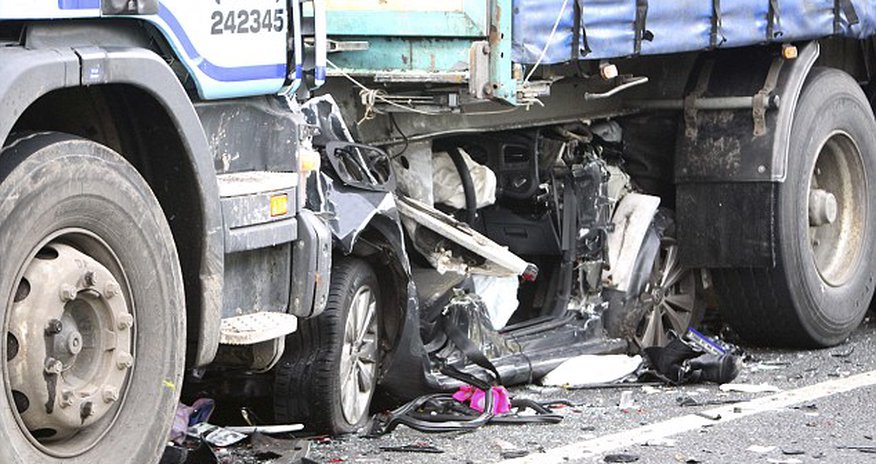 VW Golf completely crushed under articulated lorry VW Golf completely crushed under articulated lorry