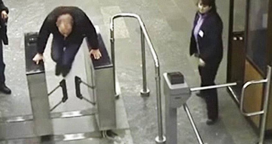 Ukrainian man tries to jump over 1ft-high ticket barrier but... Ukrainian man tries to jump over 1ft-high ticket barrier but...