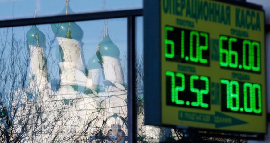 Russia's credit rating is cut to junk by S&P Russia's credit rating is cut to junk by S&P