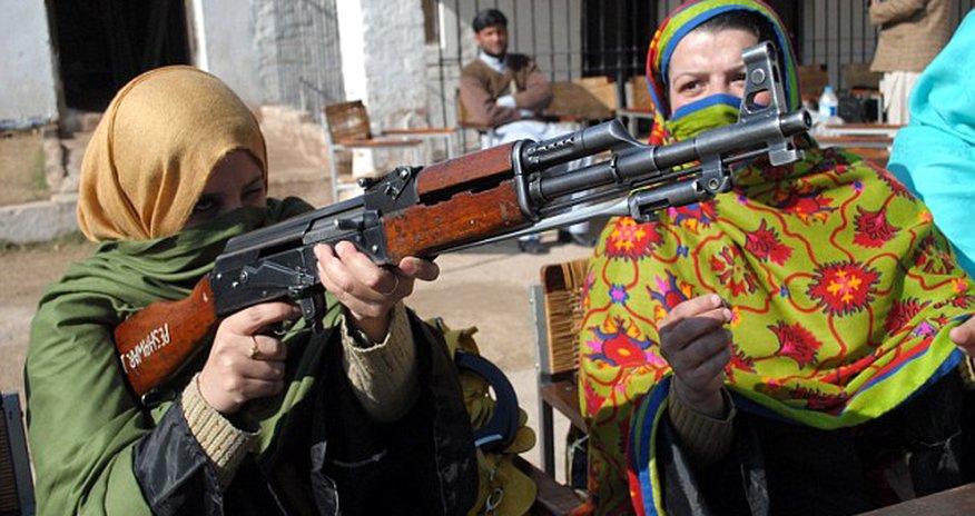 Women trained to use Kalashnikovs and handguns… to defend their CLASSROOMS Women trained to use Kalashnikovs and handguns… to defend their CLASSROOMS