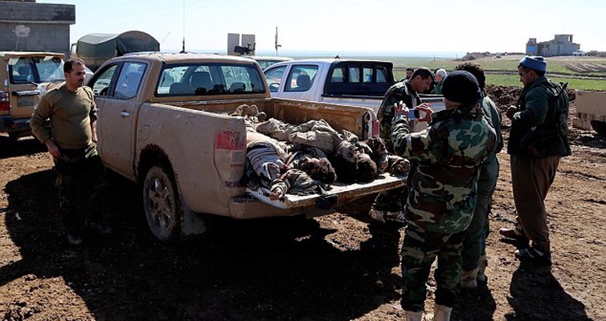 Bodies of ISIS terrorists piled onto pickup truck Bodies of ISIS terrorists piled onto pickup truck