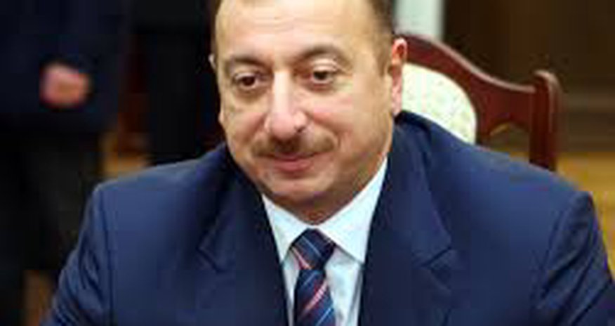 Azeri president calls manat's devaluation necessary measure Azeri president calls manat's devaluation necessary measure